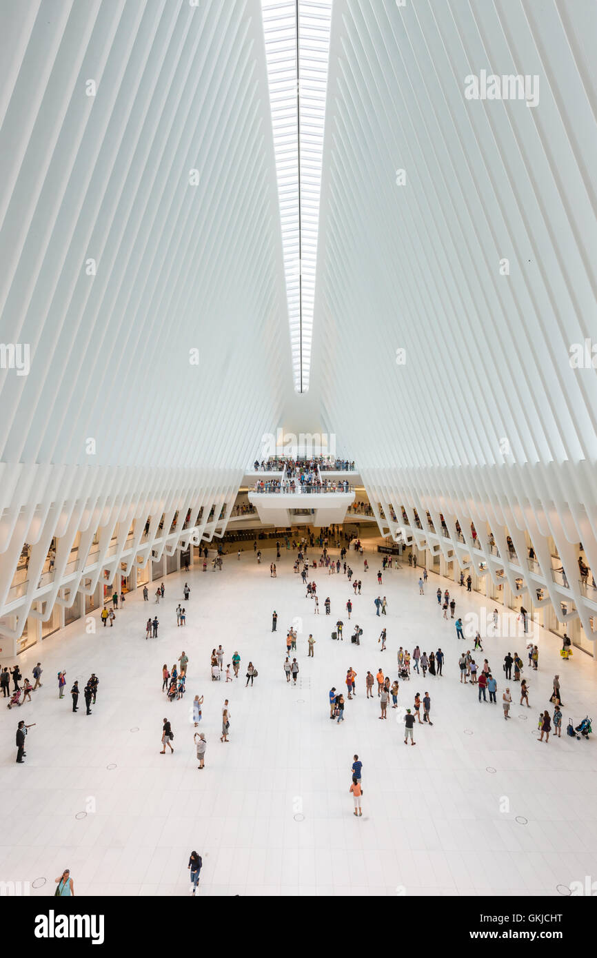People enjoy the view inside the Oculus and stores in Westfield World Trade Center mall in the World Trade Center Transportation Hub in New York City. Stock Photo