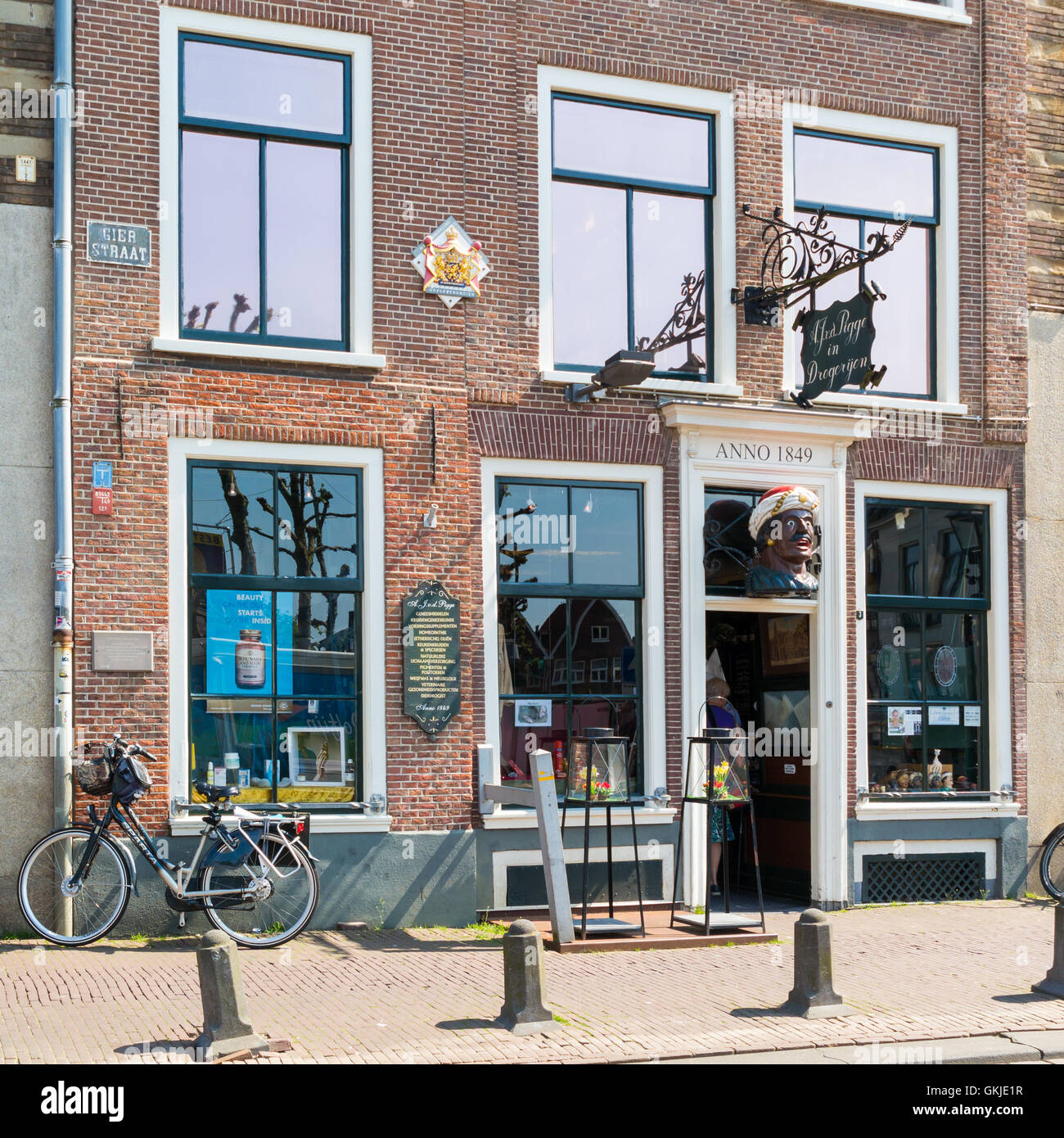 Front facade of old drugstore and pharmacy in Gierstraat street in downtown Haarlem, Holland, Netherlands Stock Photo
