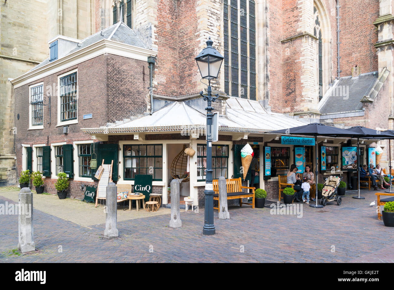 Street scene of Lepelstraat with people and coffee shop in old town of Haarlem, Holland