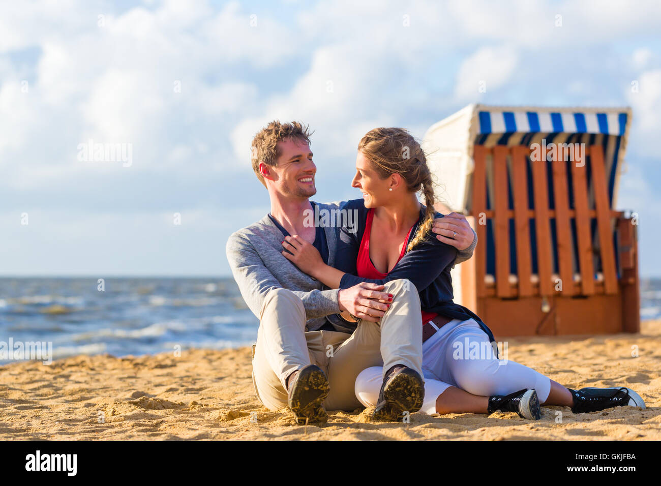 couple in romantic sunset on the beach Stock Photo