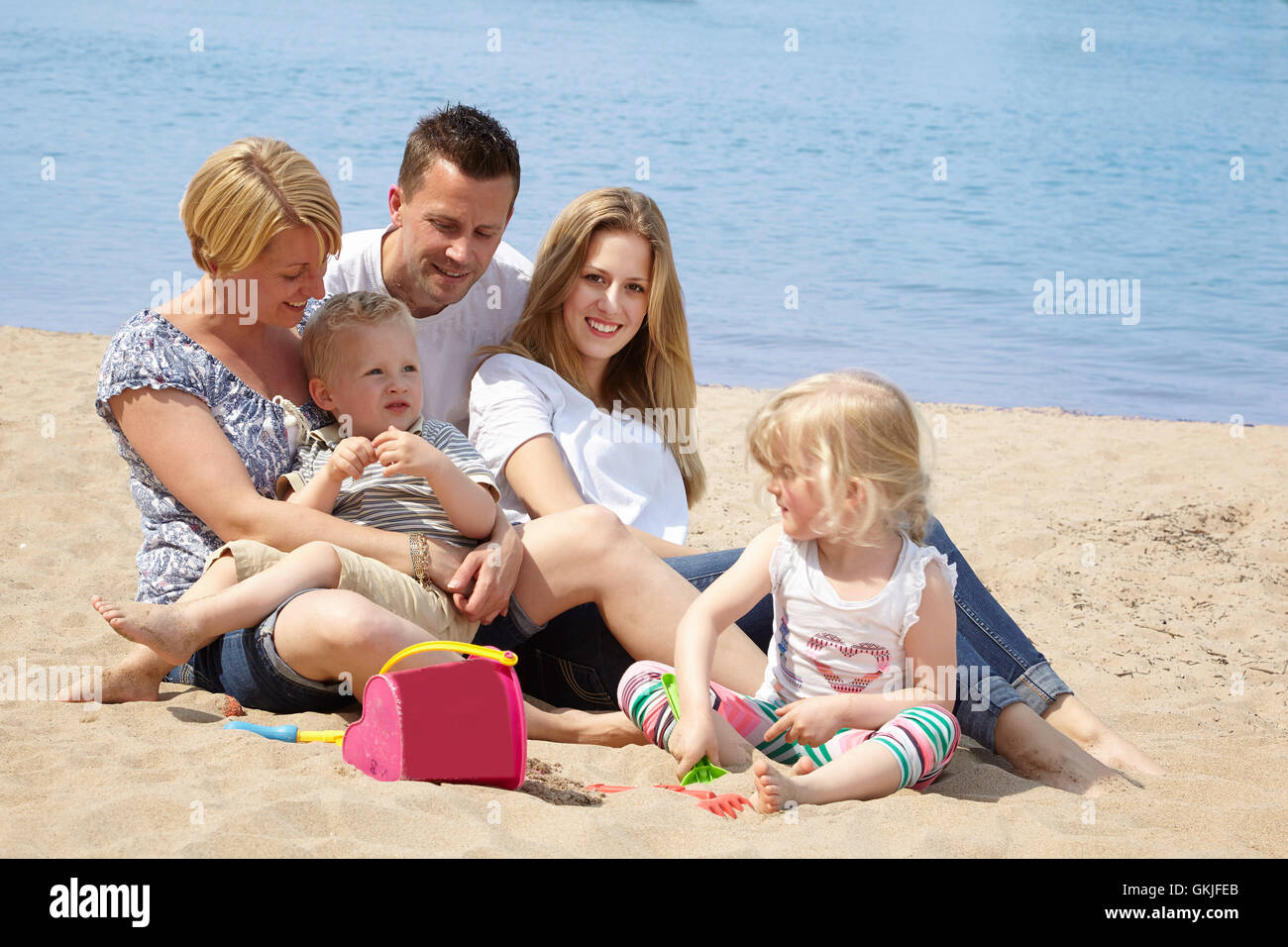 Day at the beach with family hi-res stock photography and images - Alamy