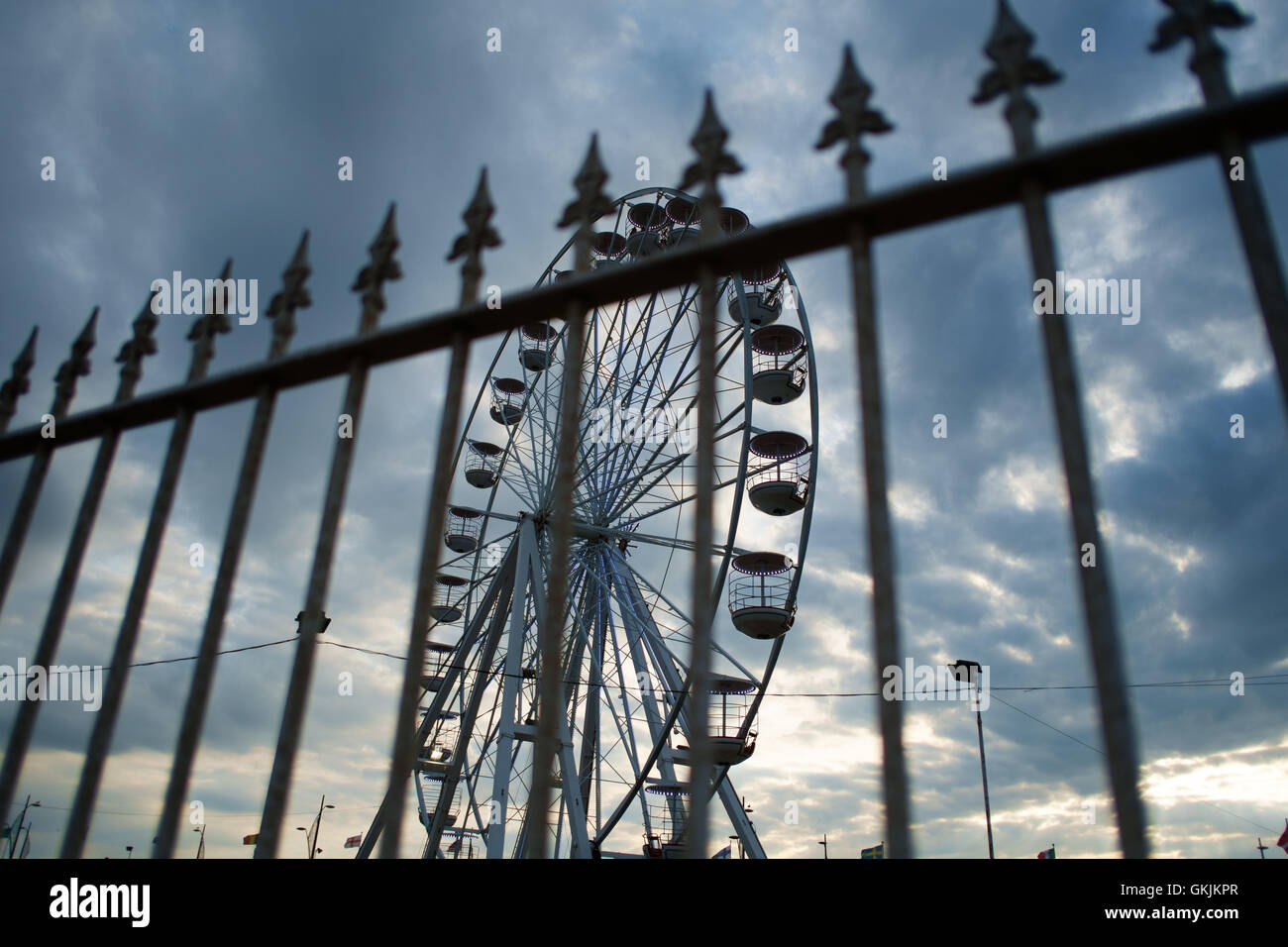 Big Wheel behind railings at sunset, Pleasure Beach, Great Yarmouth ...