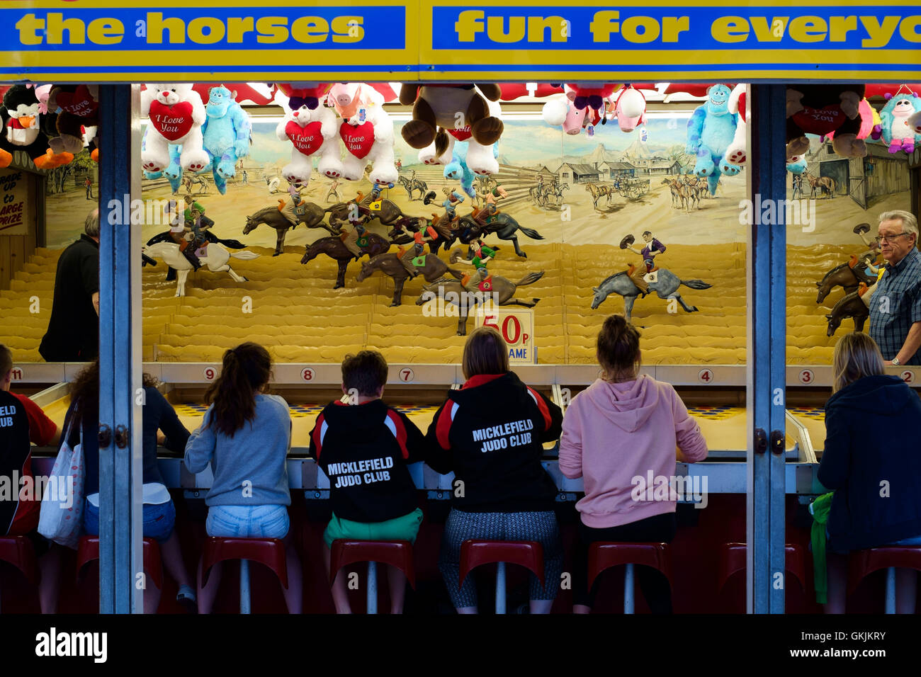 Horses game at the funfair Stock Photo Alamy