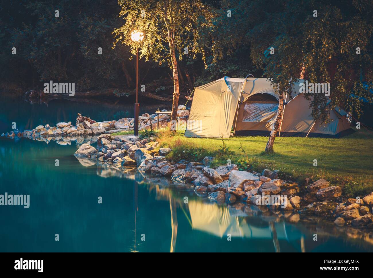 Tenting on the Glaciar Lake. Campground Camping in a Tent. Stock Photo