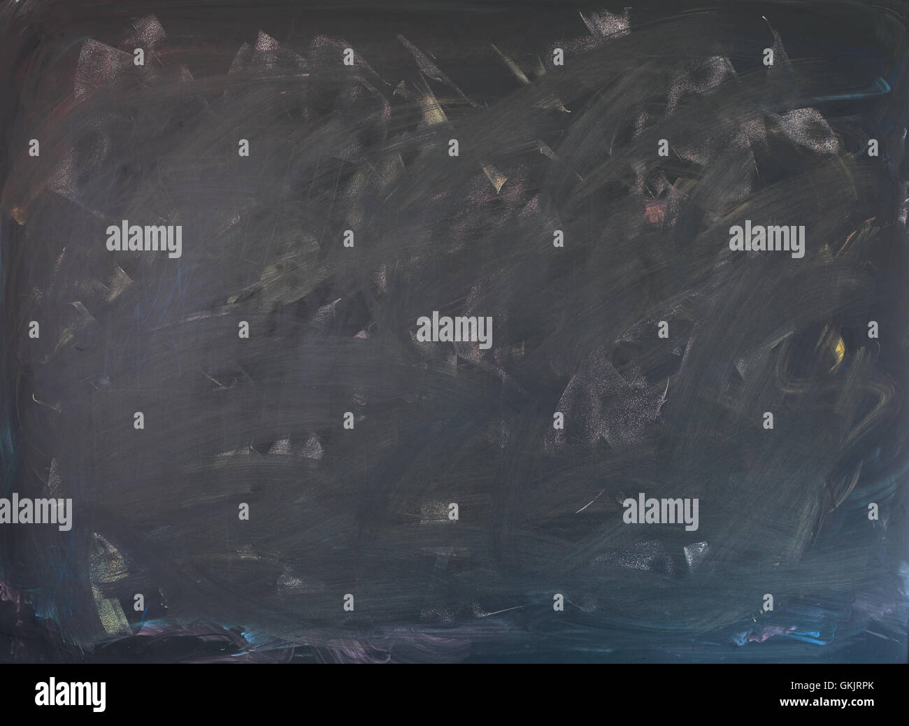 Clean chalk board surface whiped out light toning for dark symbols