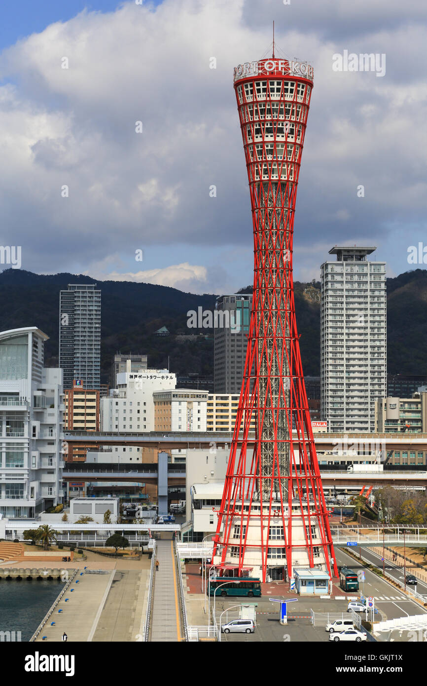 The red Port of Kobe control tower and city skyline at Kobe, Japan. Stock Photo