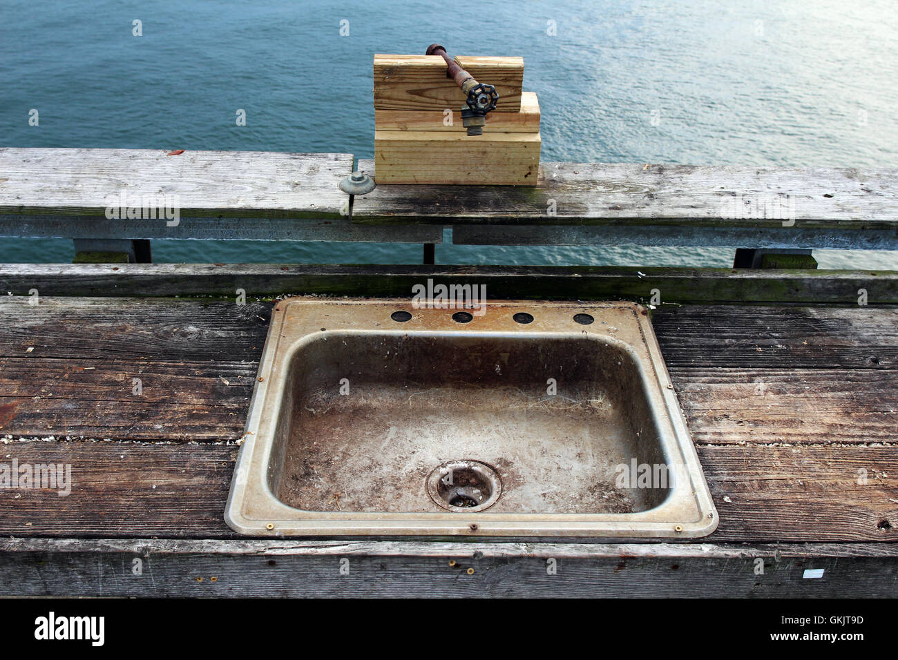 A public fish cleaning station Stock Photo Alamy