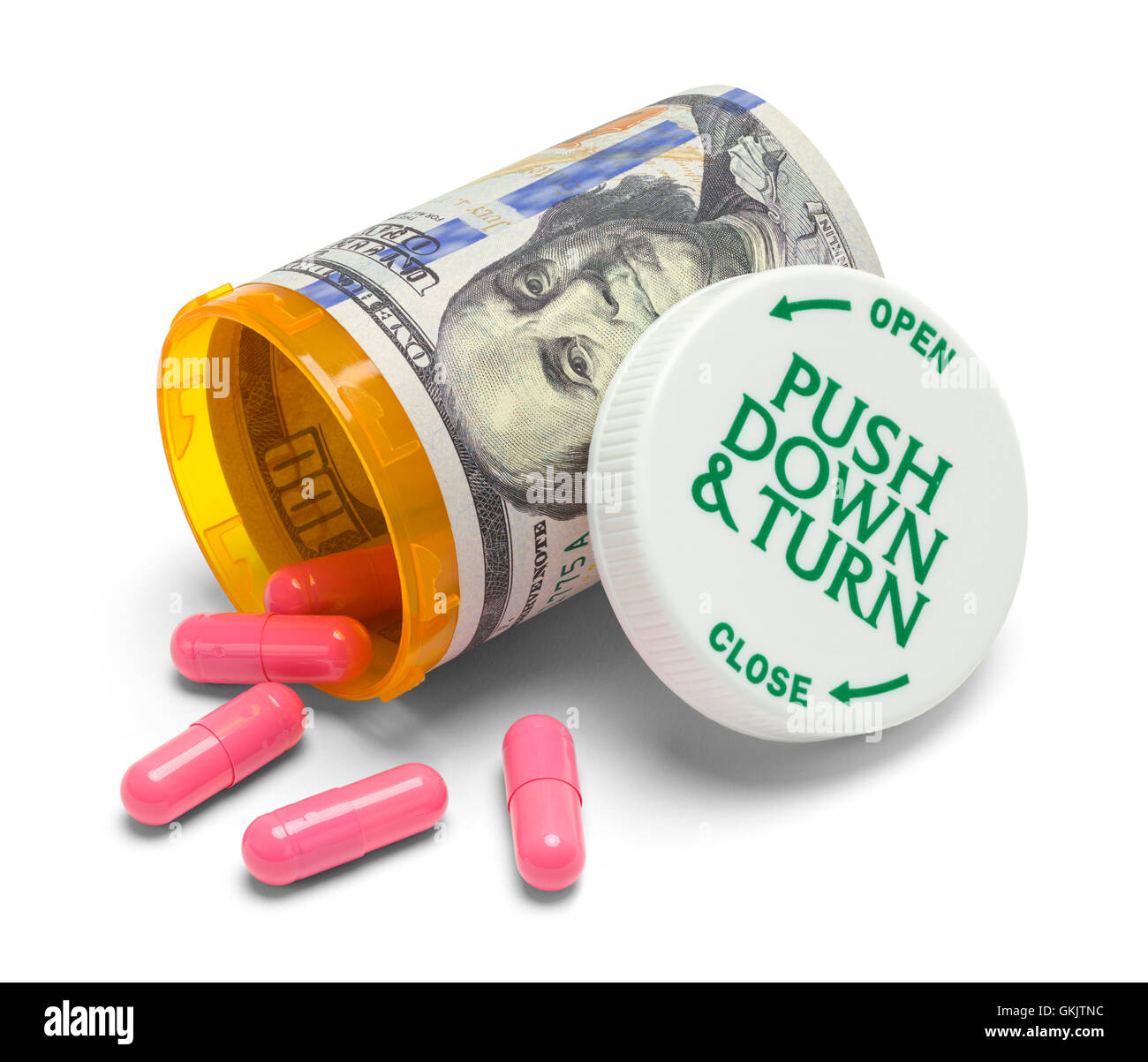 Money Pill Bottle with Pink Pills Isolated on White Background. Stock Photo