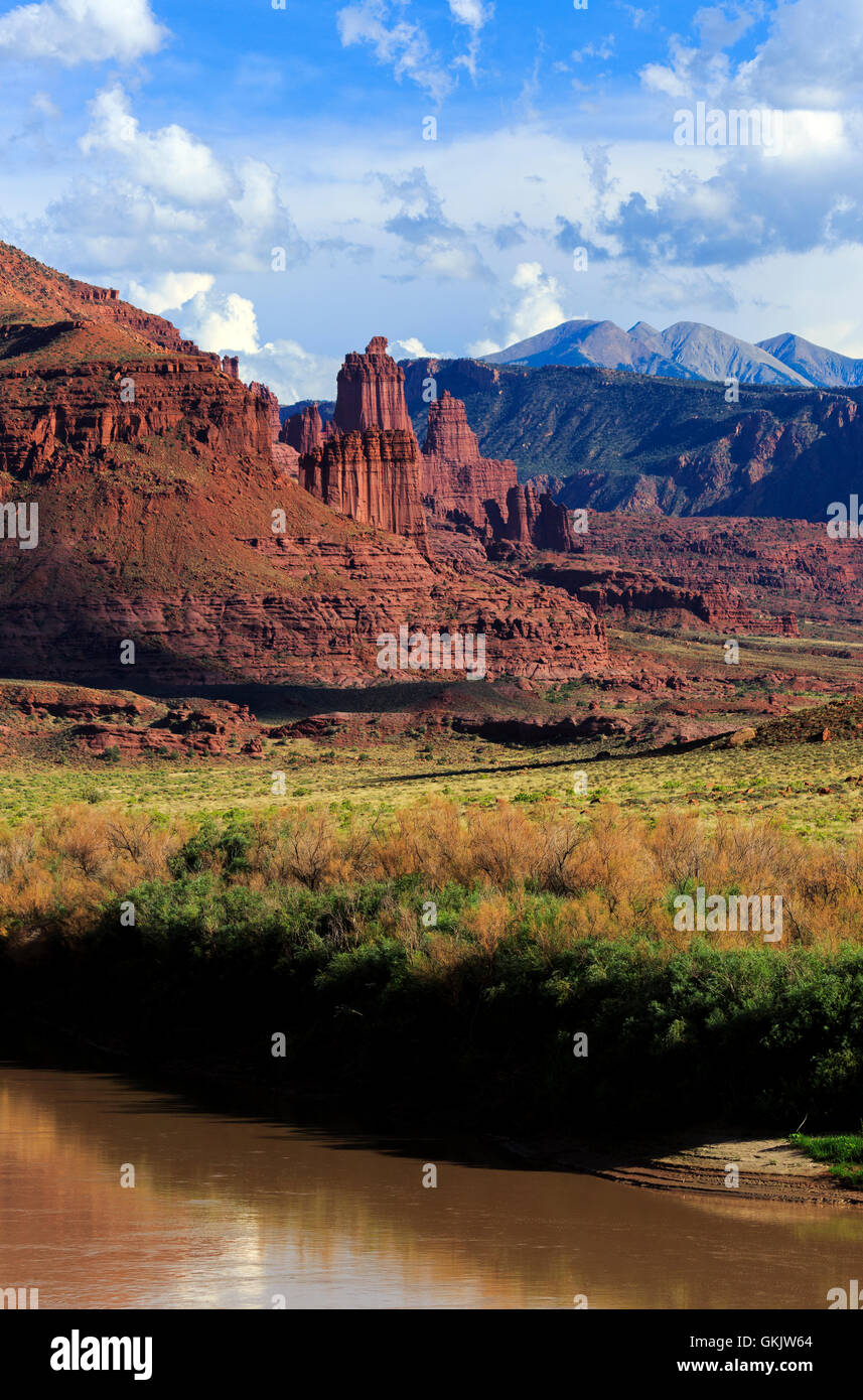 This is a vertical view of the Fisher Towers formation with the Colorado River in the foreground. Stock Photo