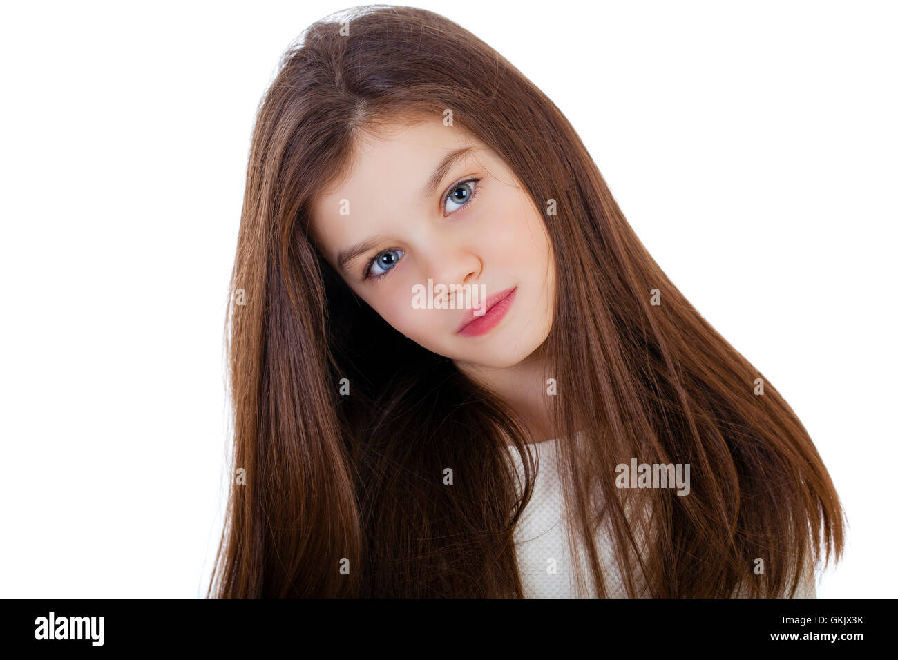Portrait of a charming little girl, isolated on white background Stock ...