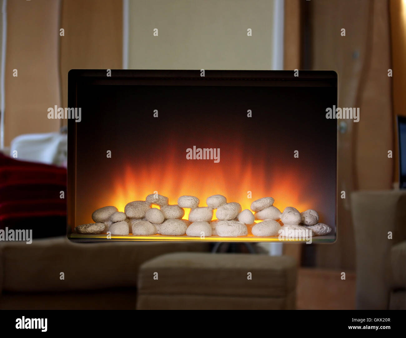 Electric fire with mirror surround Stock Photo