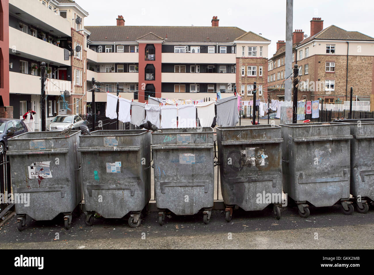 communal bins and play area of dublin social housing oliver bond flats in the liberties dublin city centre Ireland Stock Photo