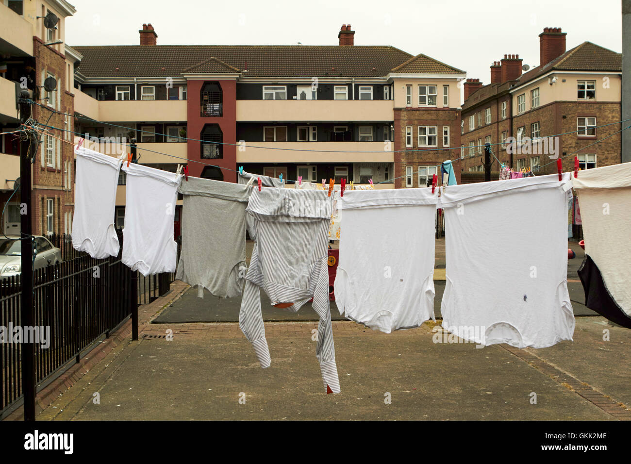 washing hanging from line in play area of dublin social housing oliver