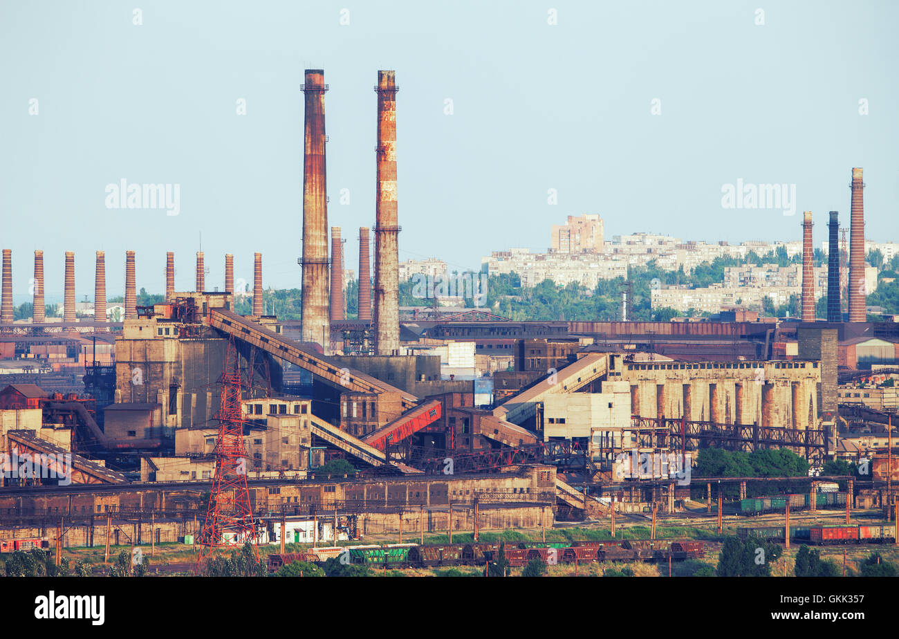 Industrial landscape. Steel factory with pipes at sunset. Metallurgical plant. steelworks, iron works. Heavy industry in Mariupo Stock Photo