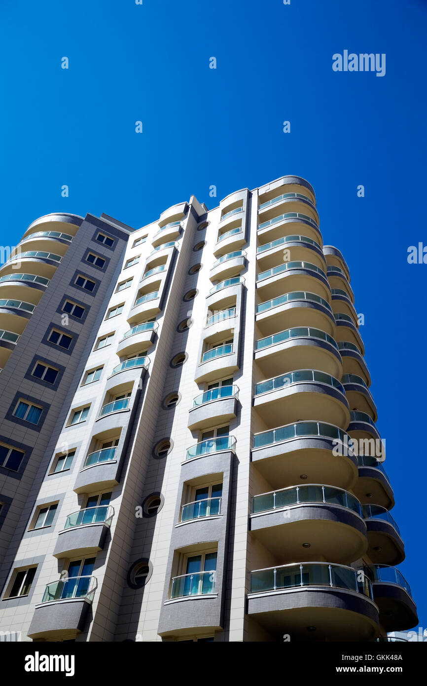 high modern residential building on a background blue sky Stock Photo ...