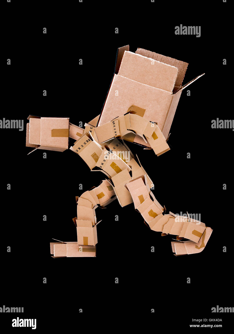 Box character carrying large box Stock Photo