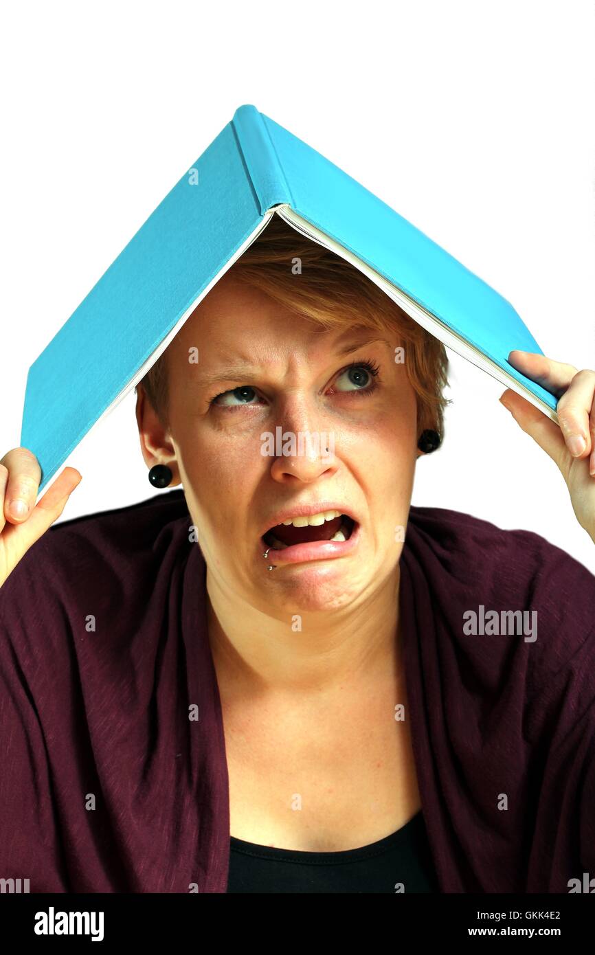 Angry Learn girl with book angry about learning Stock Photo - Alamy