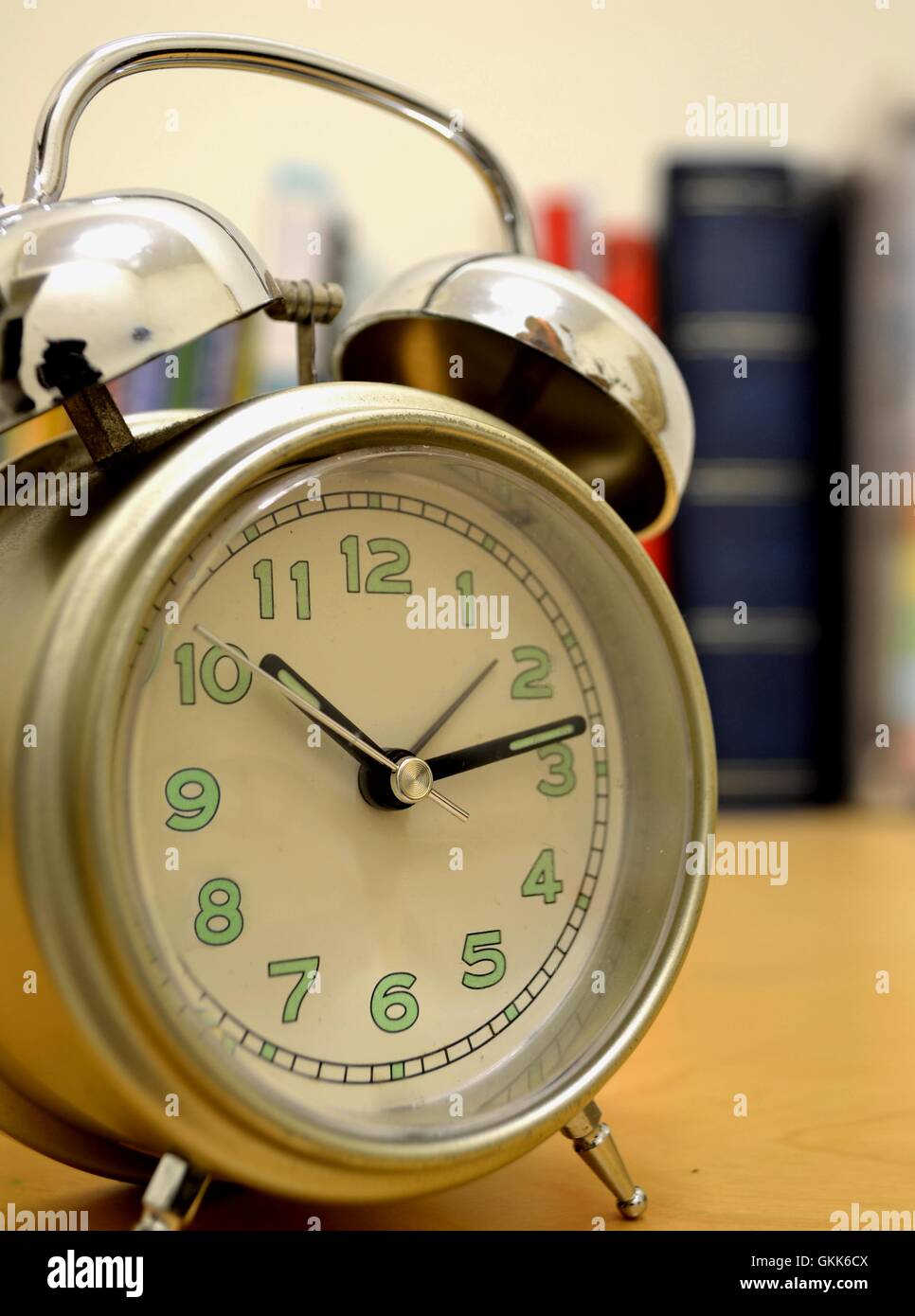 alarm clock on study desk Stock Photo Alamy