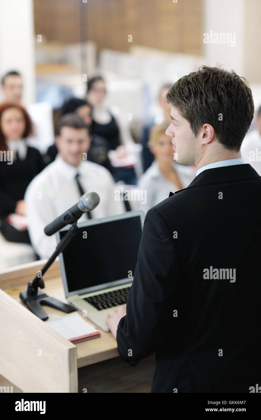 Young business man giving a presentation on conference Stock Photo - Alamy