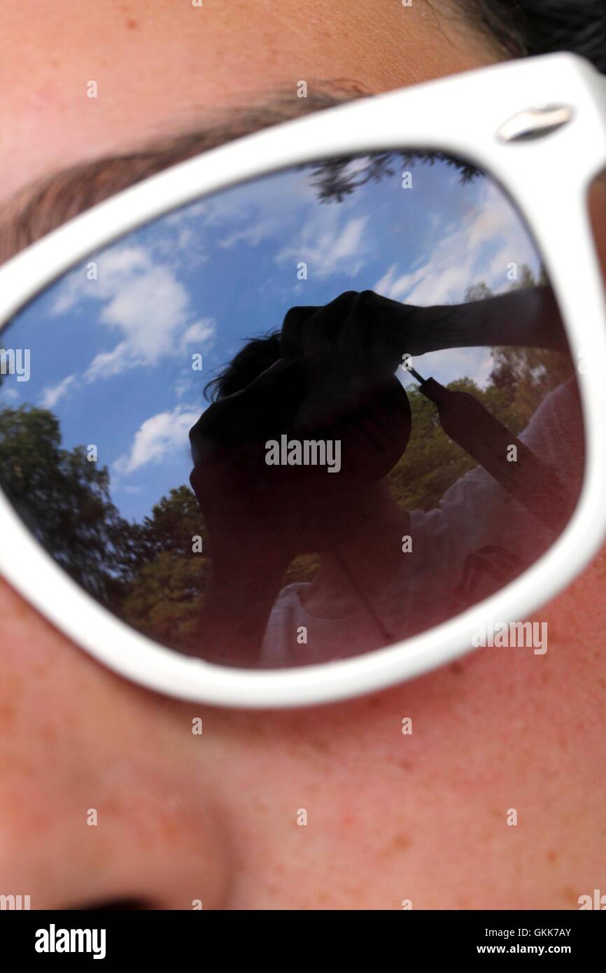 young woman with sunglasses close up Stock Photo - Alamy
