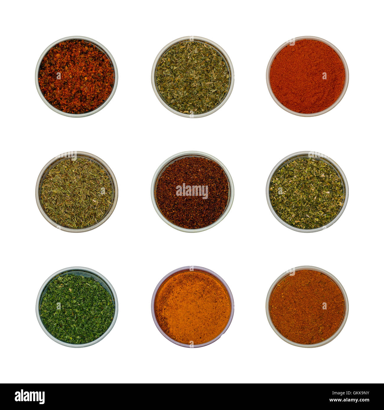 Colorful spices and herbs for cooking background and design isolated - flat lay set 2 Stock Photo