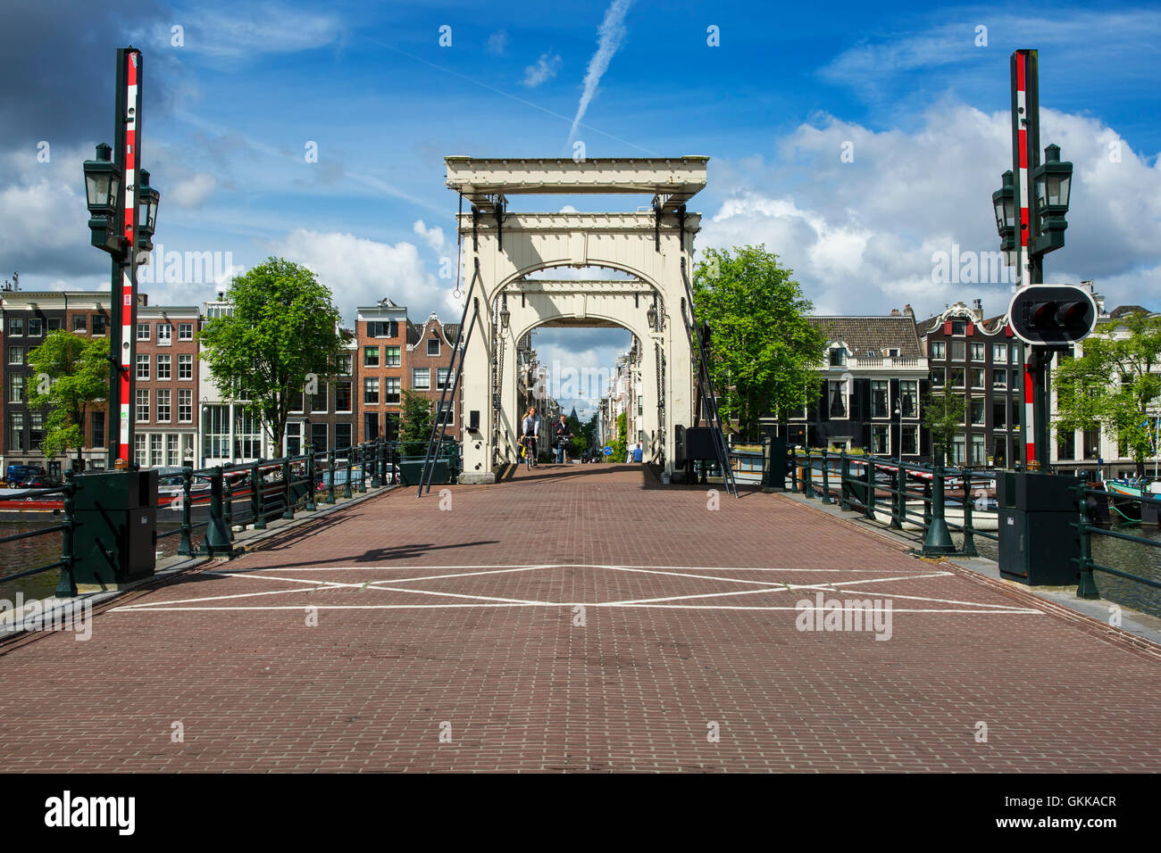 AMSTERDAM - JULY 6: The The Magere Brug ('Skinny Bridge') in Amsterdam on july 6. 2016 in Netherlands. Skinny Bridge is a bridge Stock Photo