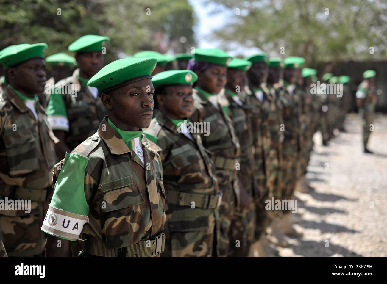 Ugandan soldiers belonging to the African Union Mission in Somalia look on during a ceremony in Baidoa, Somalia, to welcome Ethiopia into the African Union peace keeping mission on January 22. AU UN IST PHOTO / Tobin Jones Stock Photo