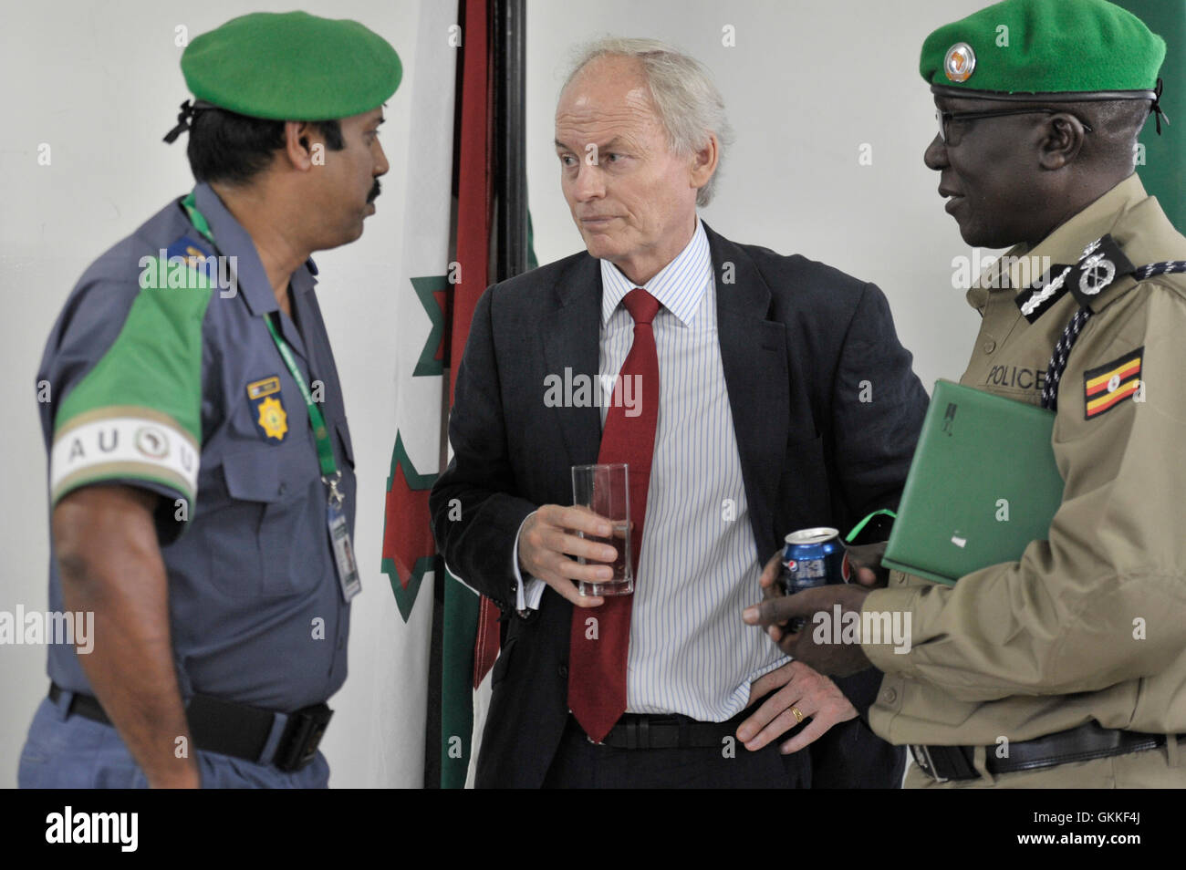 UNSOM SRSG, Nicholas Kay, talks with AMISOM Police Commisioner, Anand Pillay and AMISOM Assistant Police commissioner, Benson Oyo-Nyekoduring an event held held to celebrate Burundi's Independence day celebrationon held on 8th July 2014. AMISOM Photo / David Mutua Stock Photo