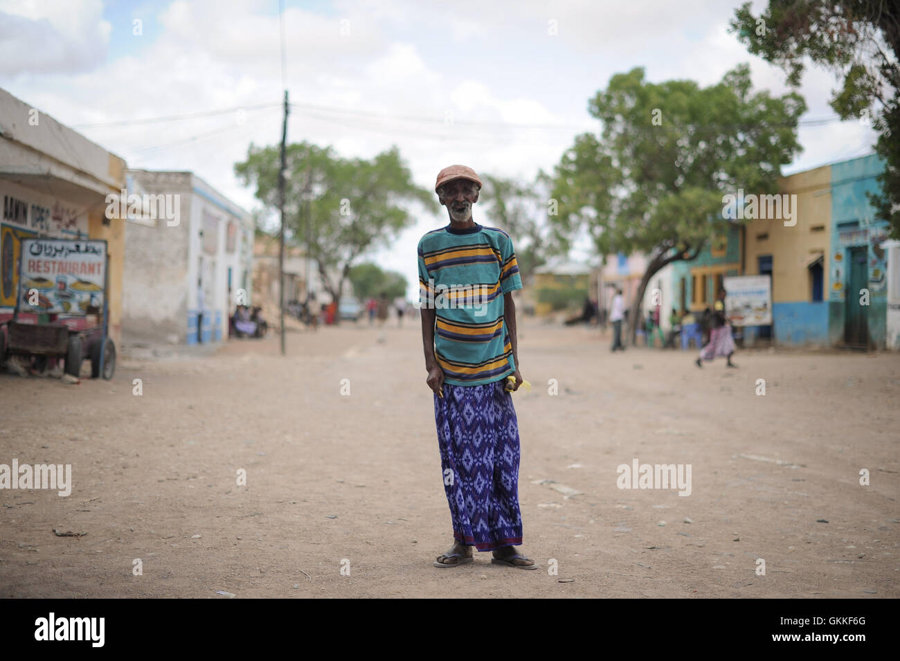 a-man-stands-on-the-main-street-of-bulo-burte-somalia-on-august-12