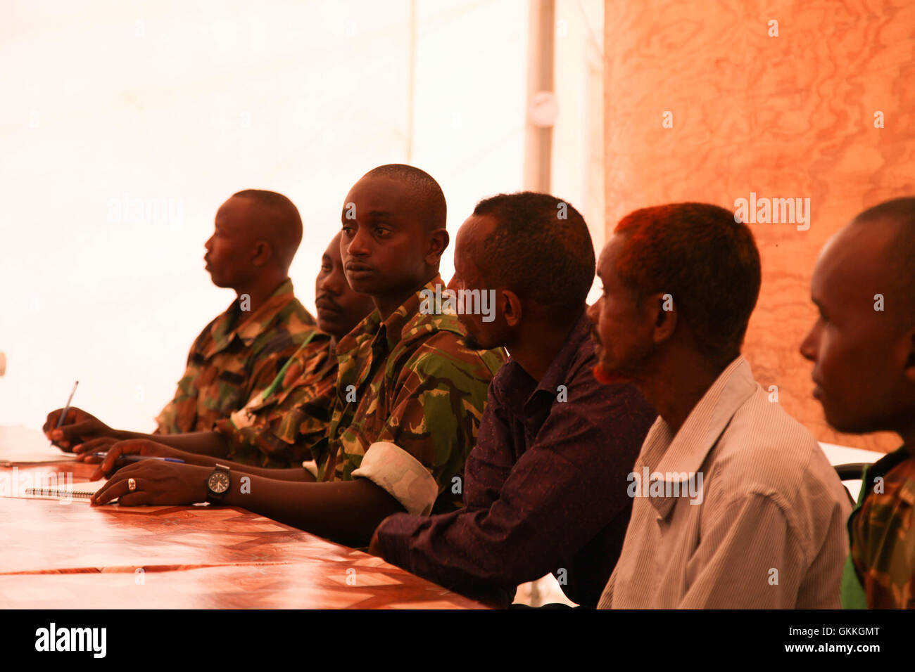 Firefighters in Kismayo, Somalia, listen to a presentation during a  training course for 20 AMISOM and IJA firefighters conducted by the United Nations Support Office for AMISOM (UNSOA) on November 15. UN Photo Stock Photo