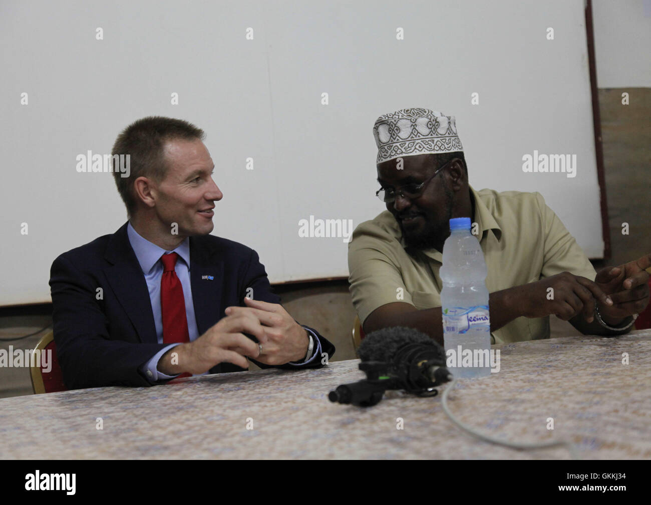 British Ambassador to Somalia Neil Wigan meets with Interim Jubba Administration  President Ahmed Madobe during his visit to Kismayu.  He congratulated the IJA upon formation of the regional Parliament on 21st April 21, 2015 . AMISOM Photo/ Awil Abukar Stock Photo