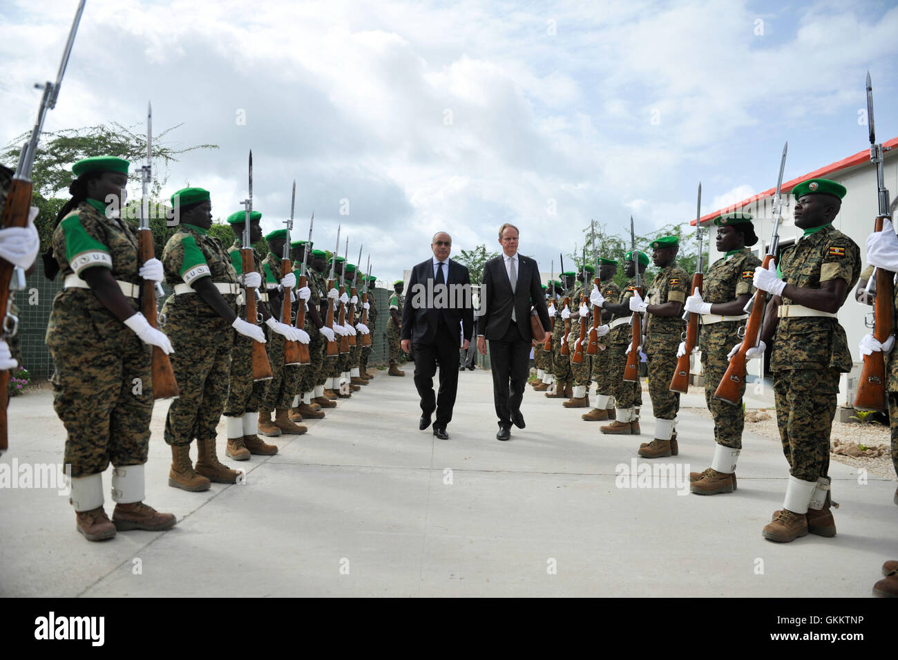 Members of the United Nations Security Council march through a guard of honour mounted y AU troops during their arrival in  Mogadishu, Somalia, on 19 May, 2016. They were received at Aden Abdulle International Airport by senior UN, AU and   Federal Government of Somalia officials. AMISOM Photo / Omar Abdisalan Stock Photo