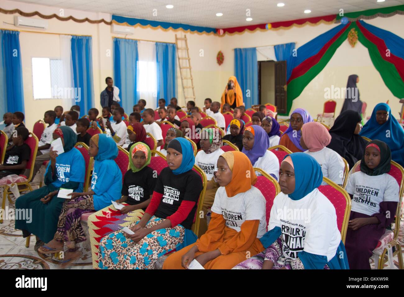 Children attend celebrations of the Day of African Child which was organised by the Ministry of Human Rights and Family Affairs of the Interim South West Administration (ISWA), held in Baidoa, Somalia on June 16, 2016.  AMISOM Photo / Abdikarim Mohamed Stock Photo