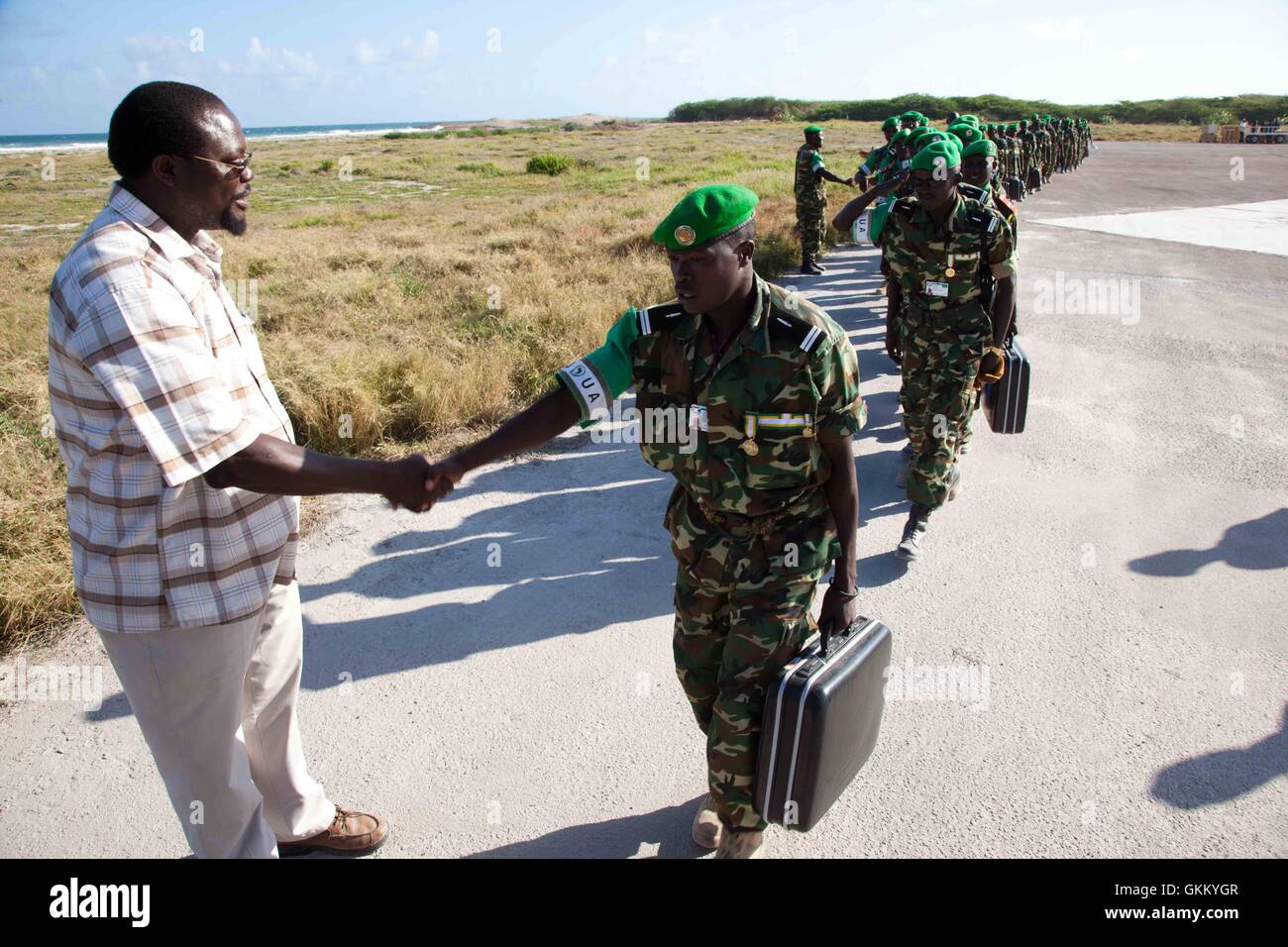 12/09/2011 - Mogadishu Airport, Somalia - Wafula Wamuniyi, Deputy Special Representative for AMISOM thanks departing Burundian troops for their service at Mogadishu Airport Stock Photo