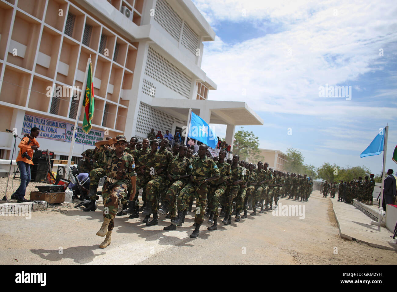 SOMALIA, Mogadishu: In photograph taken and released by the African Union-United Nations Information Support Team 12 April 2013, soldiers of the Somali National Army march during a military parade marking the 53rd Anniversary of the SNA held at the newly refurbished Ministry of Defence in the Somali capital Mogadishu. Somalia is rebuilding it's army, along with many state institutions and facilities after being racked by years of internal conflict and division and is enjoying it's longest period of relative peace since major operations by the SNA supported by forces of the African Union Missio Stock Photo