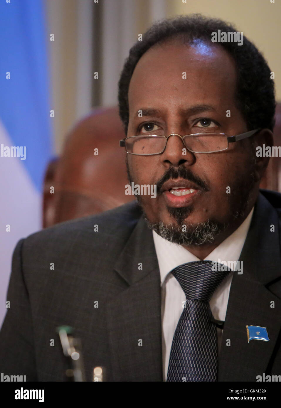 SOMALIA, Mogadishu: In photograph taken and released by the African Union-United Nations Information Support Team 19 April 2013, Somali President Hassan Sheik Mohamud is seen in his presidential office inside Villa Somalia, the complex which houses the Somali government in the country's capital Mogadishu. Listed in this year's Time Magazine list of the 100 most influential people, Mohamud is president of Somalia's first democratically elected government after two decades of civil war unrest and conflict in the Horn of Africa nation. AU-UN IST PHOTO / STUART PRICE. Stock Photo