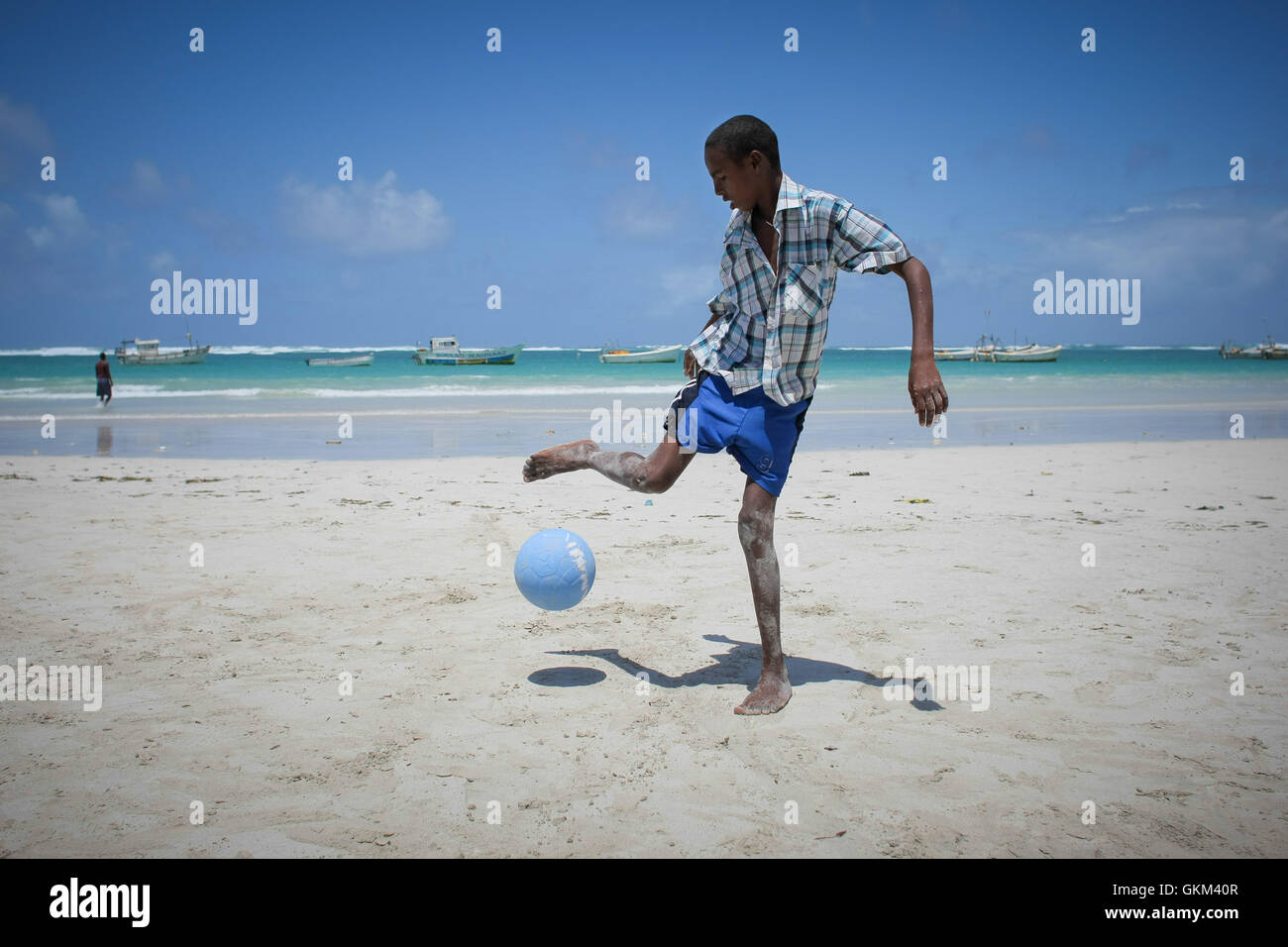 On August 5, 2013, a Somali boy played football on Lido Beach in ...