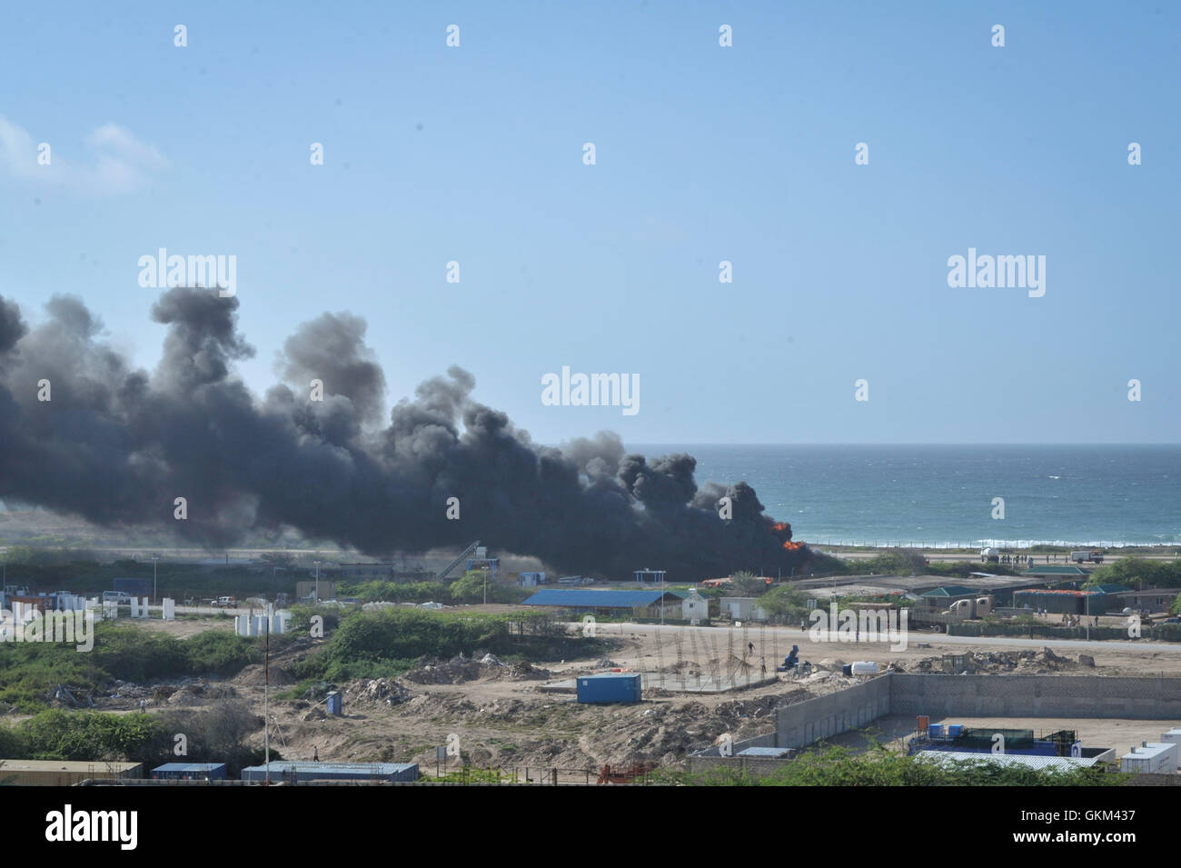 An Ethiopian Air Force aircraft crashed upon landing this morning at Mogadishu's Aden Adde International Airport in Somalia on August 9. Two of the six crew members survived the crash. AU UN IST PHOTO / TOBIN JONES Stock Photo