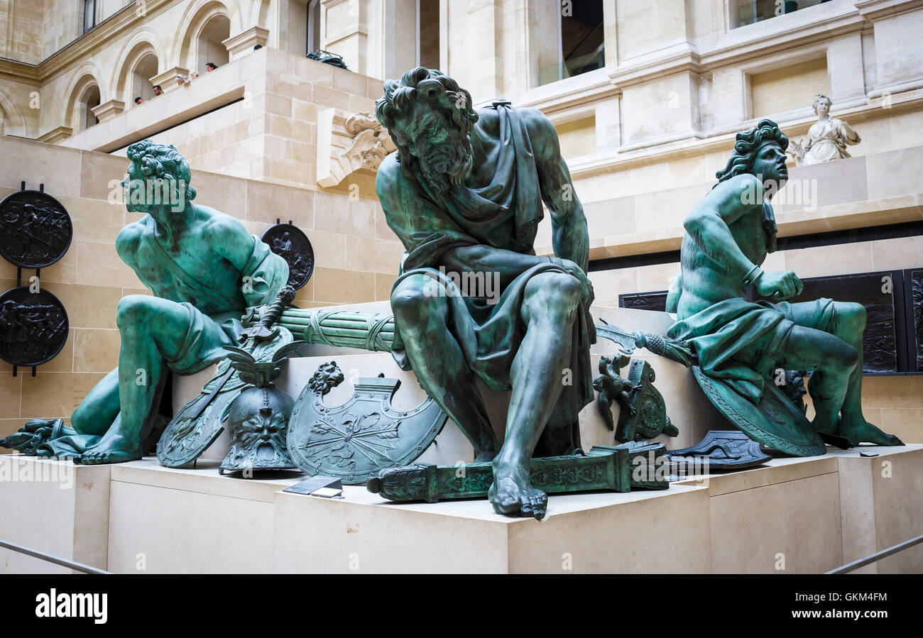 Four Captives Sculpture in Louvre Museum, Paris, France Stock Photo - Alamy
