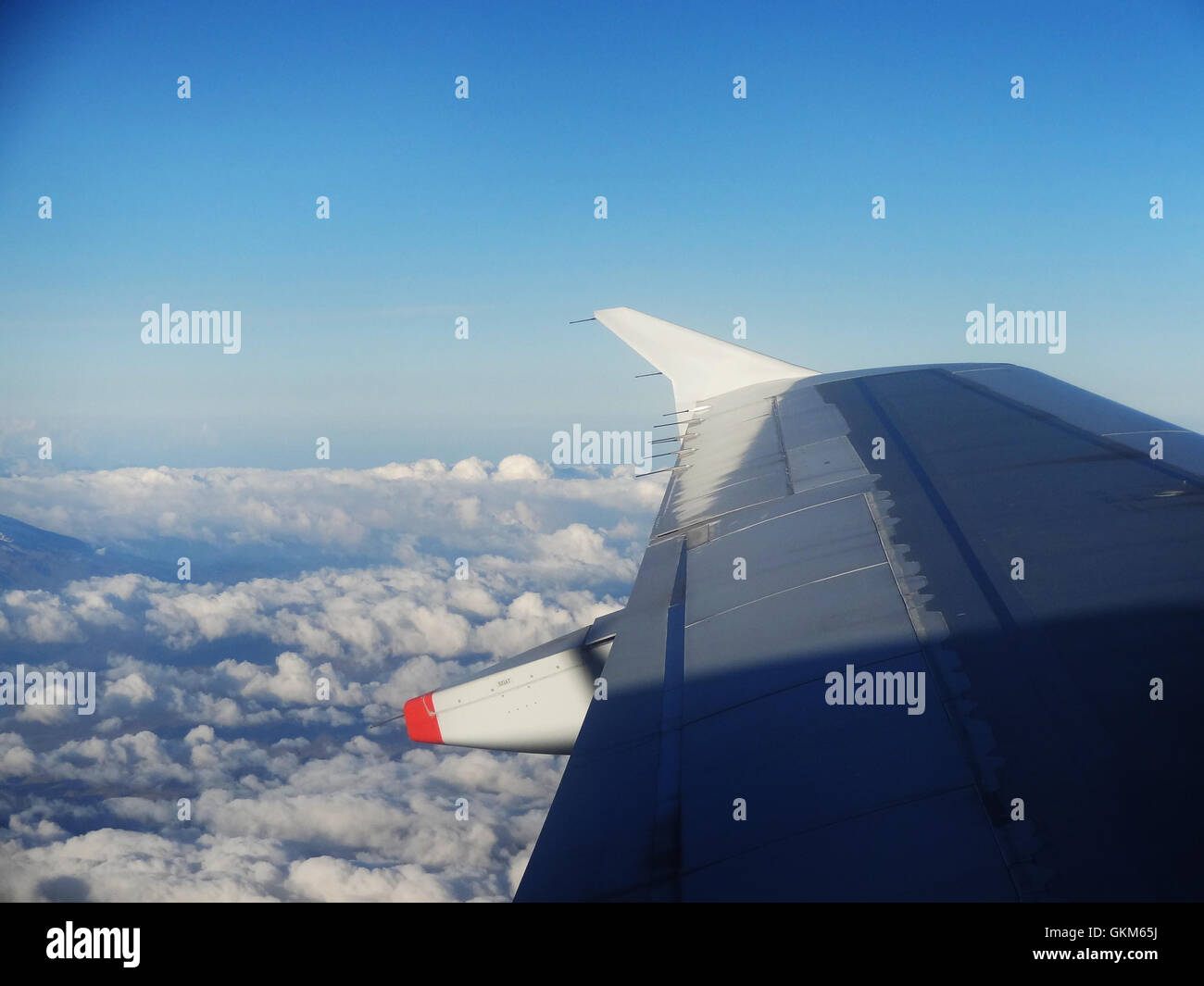 Wing of an airplaine Stock Photo