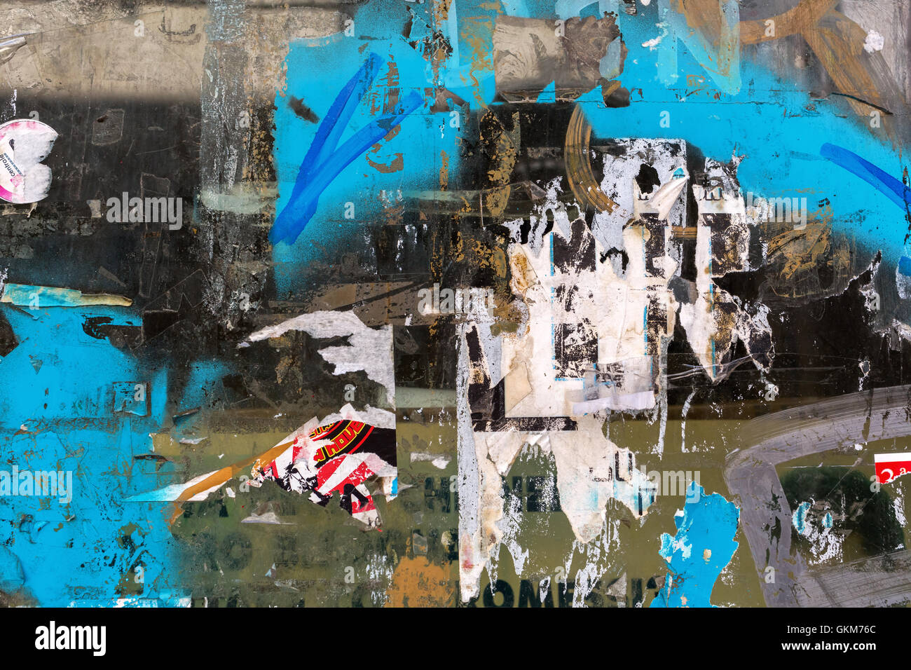 grunge like background texture of torn placards and other papers Stock ...