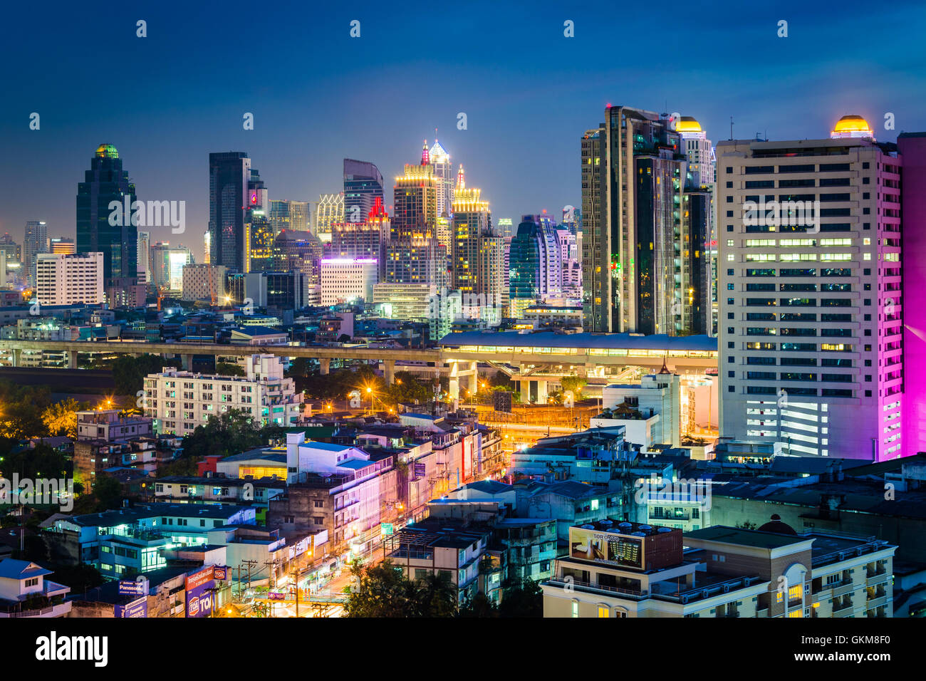 View of modern skyscrapers at night, in Bangkok, Thailand Stock Photo ...