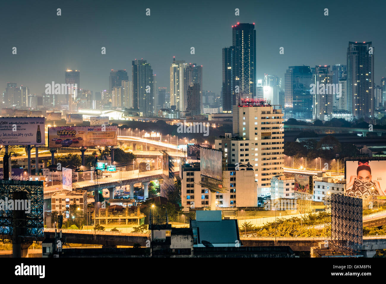 View of skyscrapers at night, in Bangkok, Thailand. Stock Photo