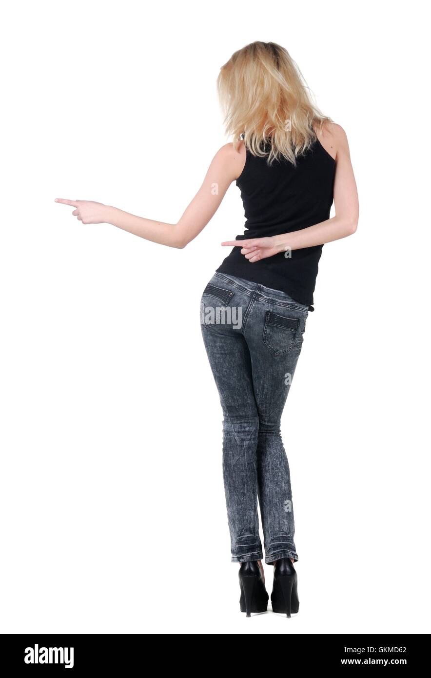 Back view pointing wall young Cut Out Stock Images & Pictures - Alamy