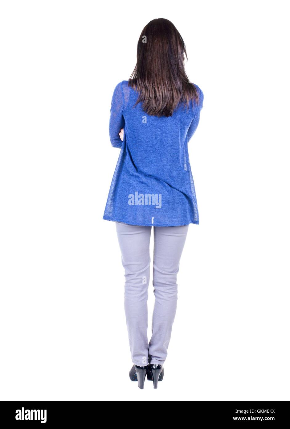 back view of standing young beautiful brunette woman Stock Photo - Alamy