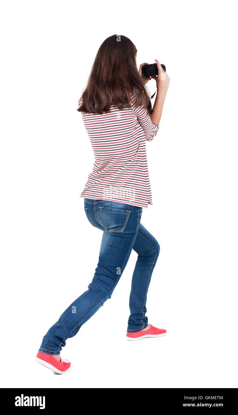Back view of woman photographing Stock Photo - Alamy