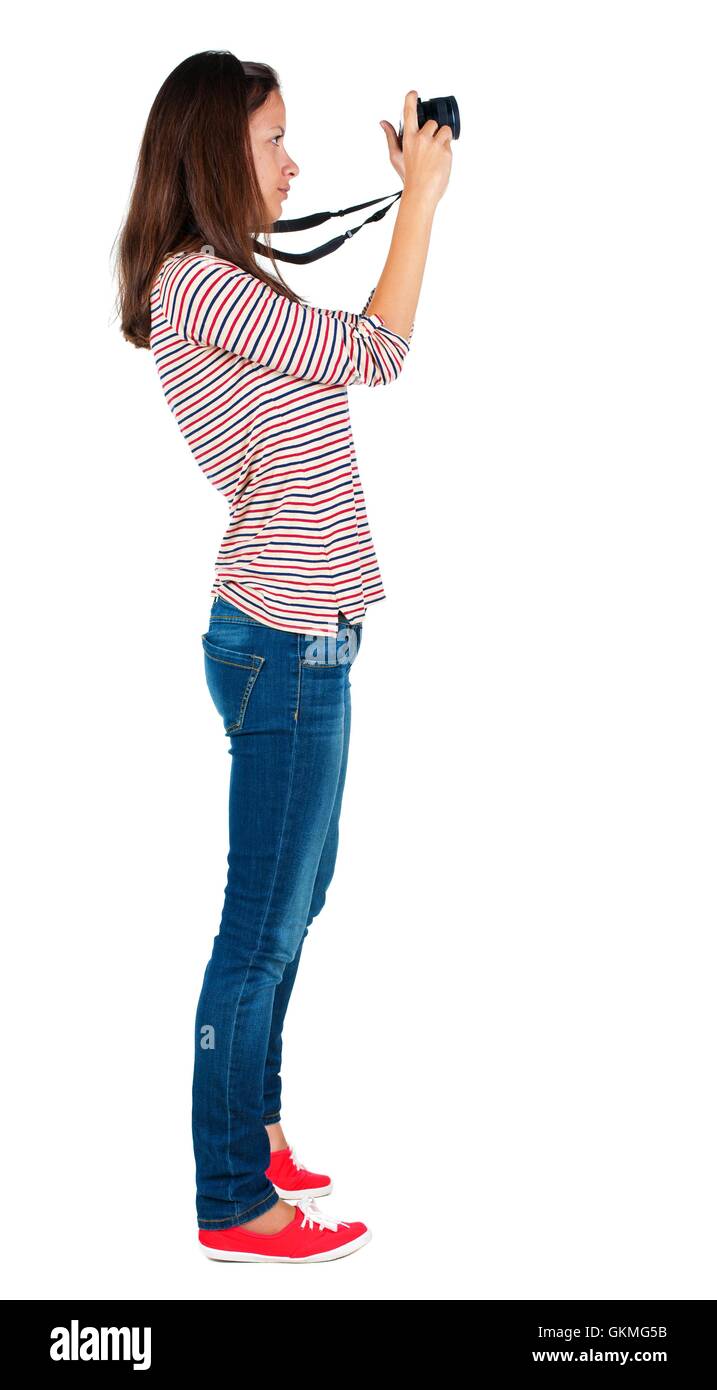 Back view of woman photographing Stock Photo - Alamy