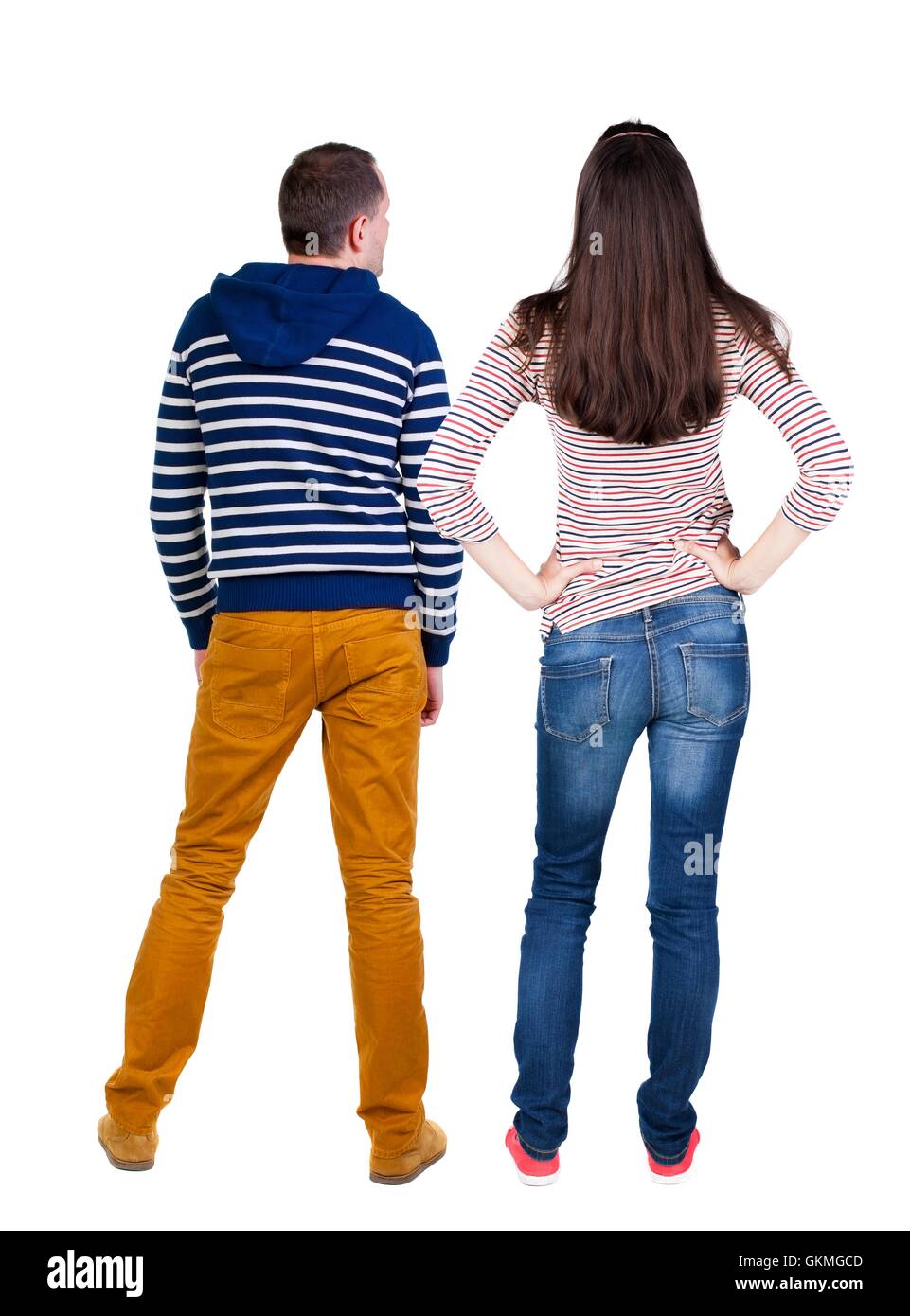 Back view of young couple hug and look into the distance Stock Photo ...