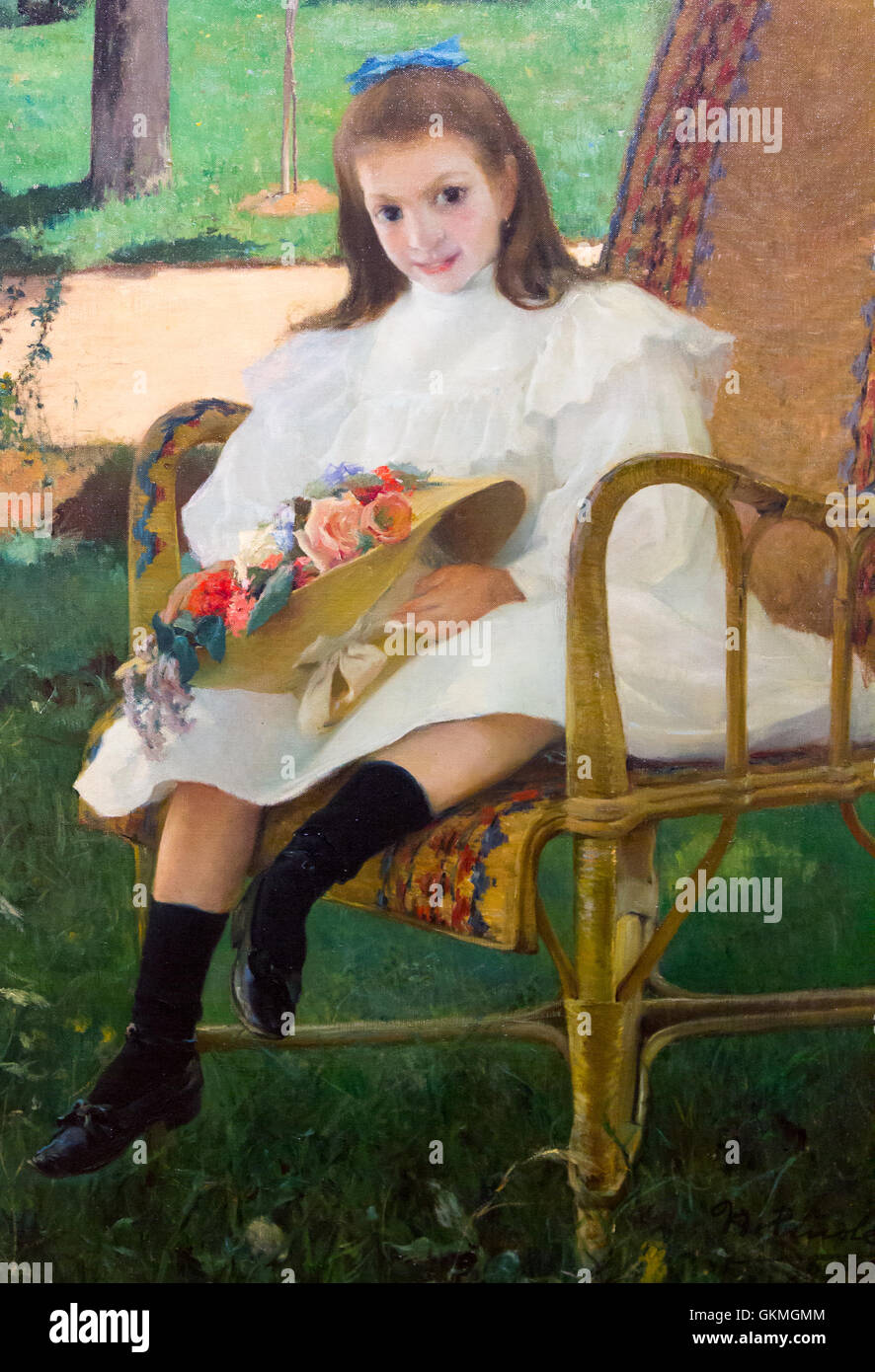 Picture of a girl sitting on a garden Stock Photo - Alamy