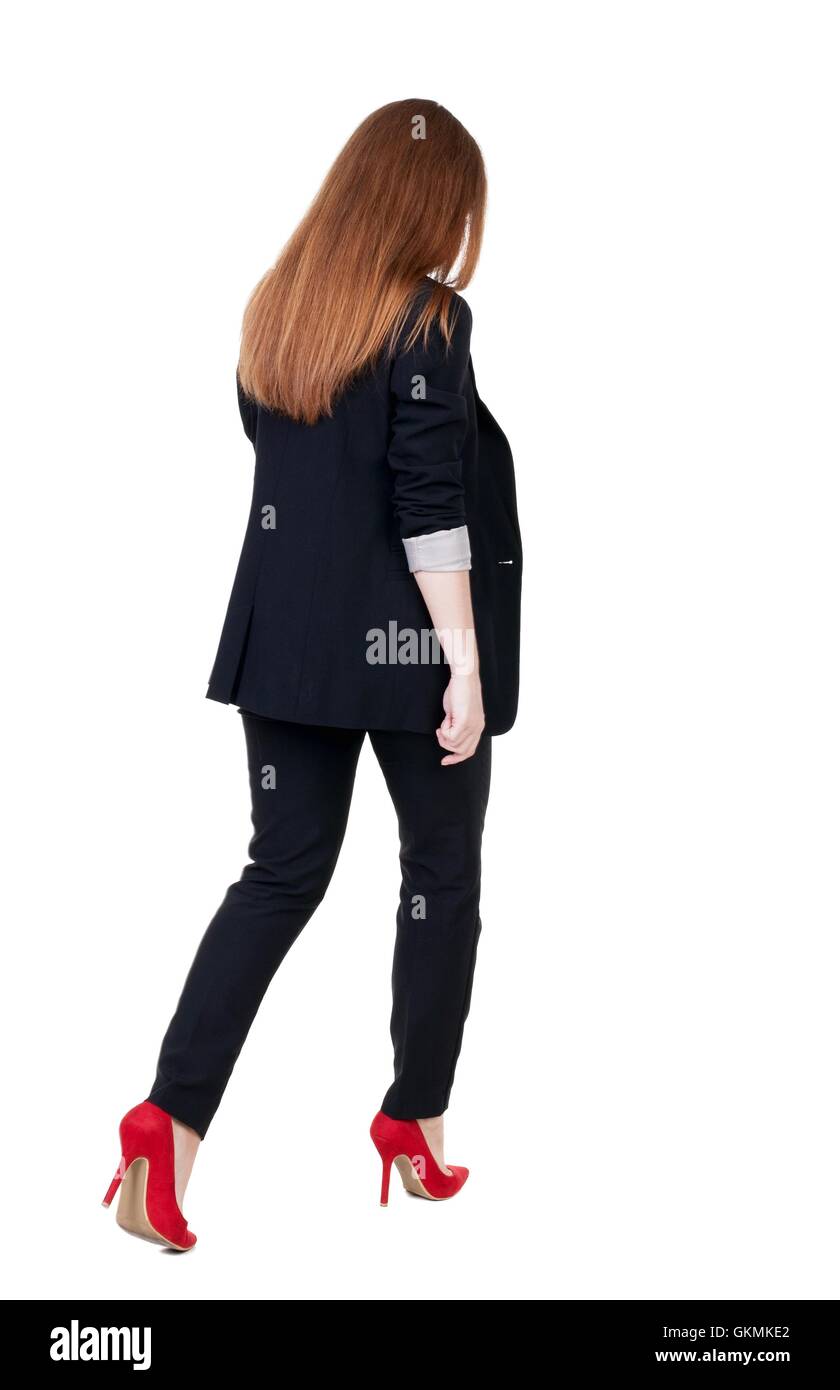 walking red head business woman Stock Photo - Alamy